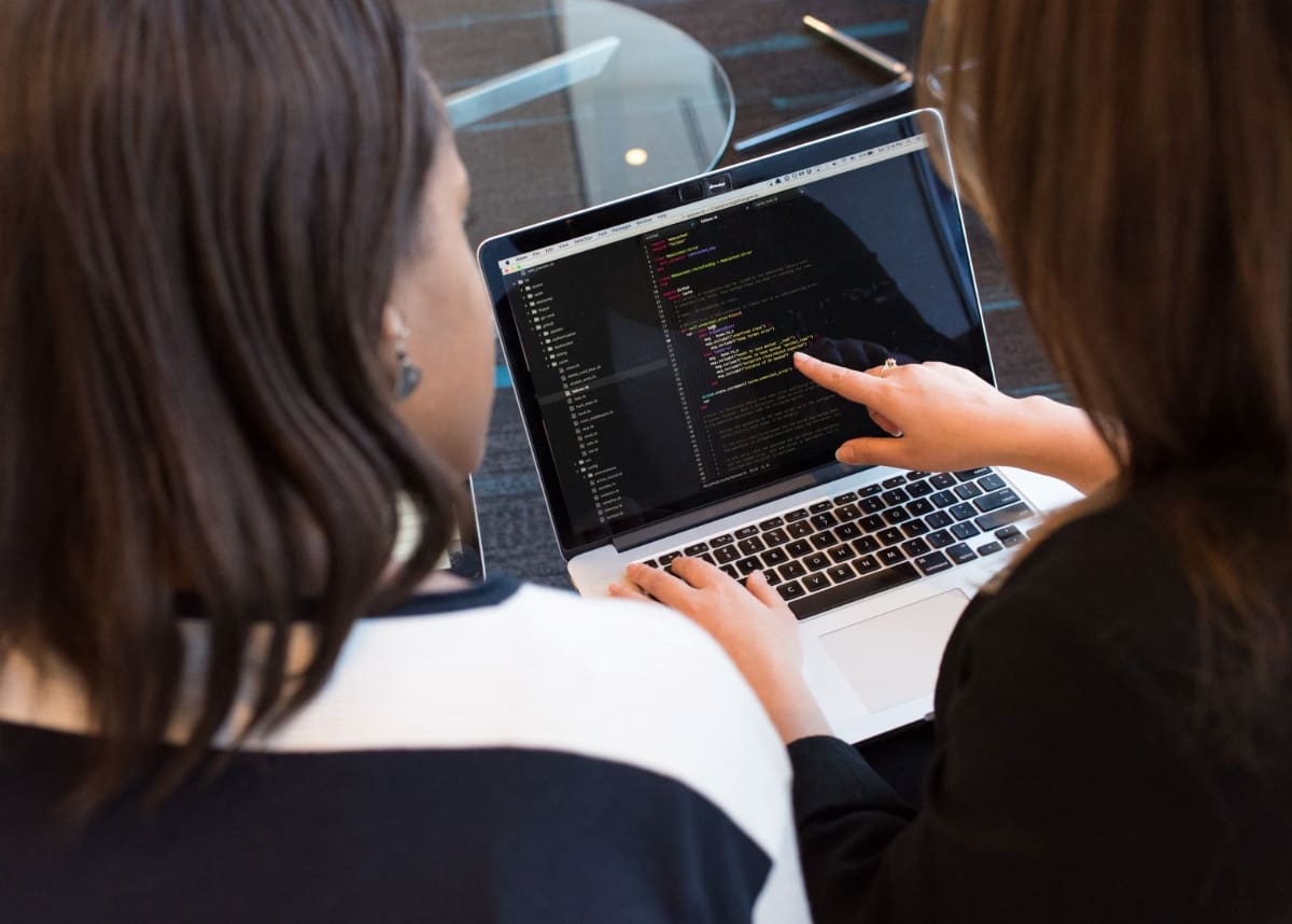 Women looking at computer screen