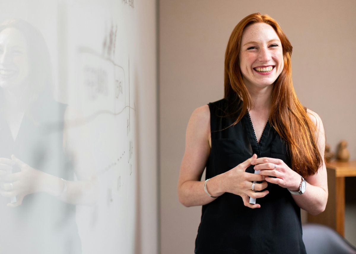 Red haired woman smilking