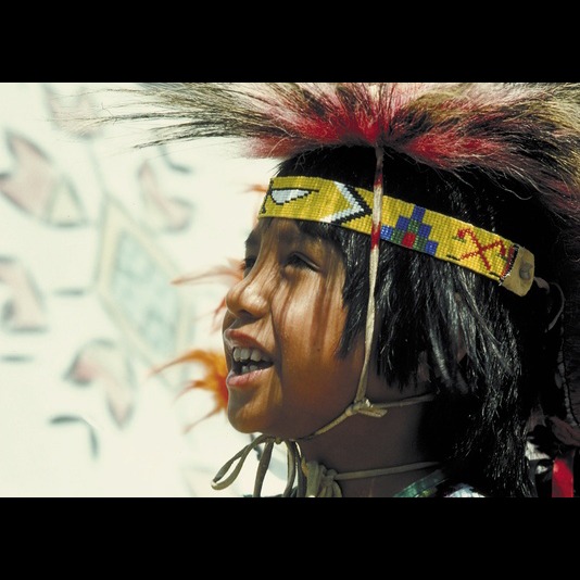 Native child wearing colorful headband