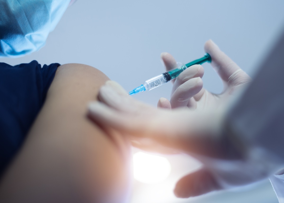 Image of someone receiving a shot in their arm