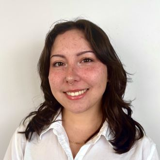 headshot of woman with brown hair, isabella tassistro