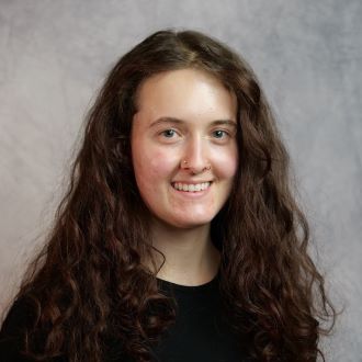 headshot of Raeann Vossberg