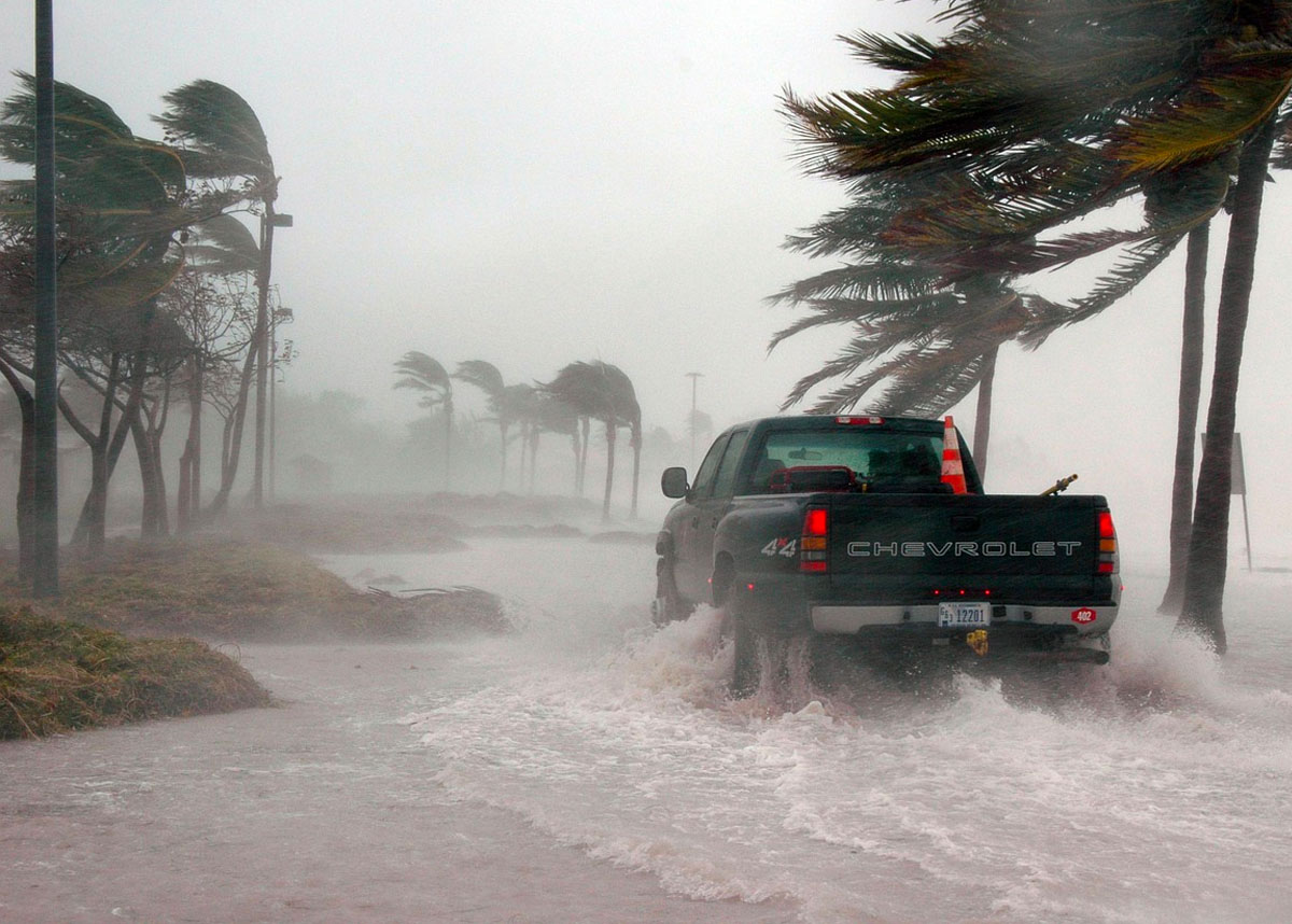 Truck driving on flooded road during a hurricane