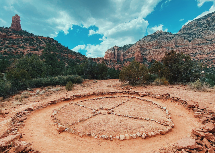 Desert landscape with medicine wheel built out of rocks
