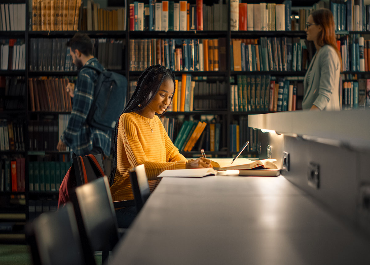 Student studying at library