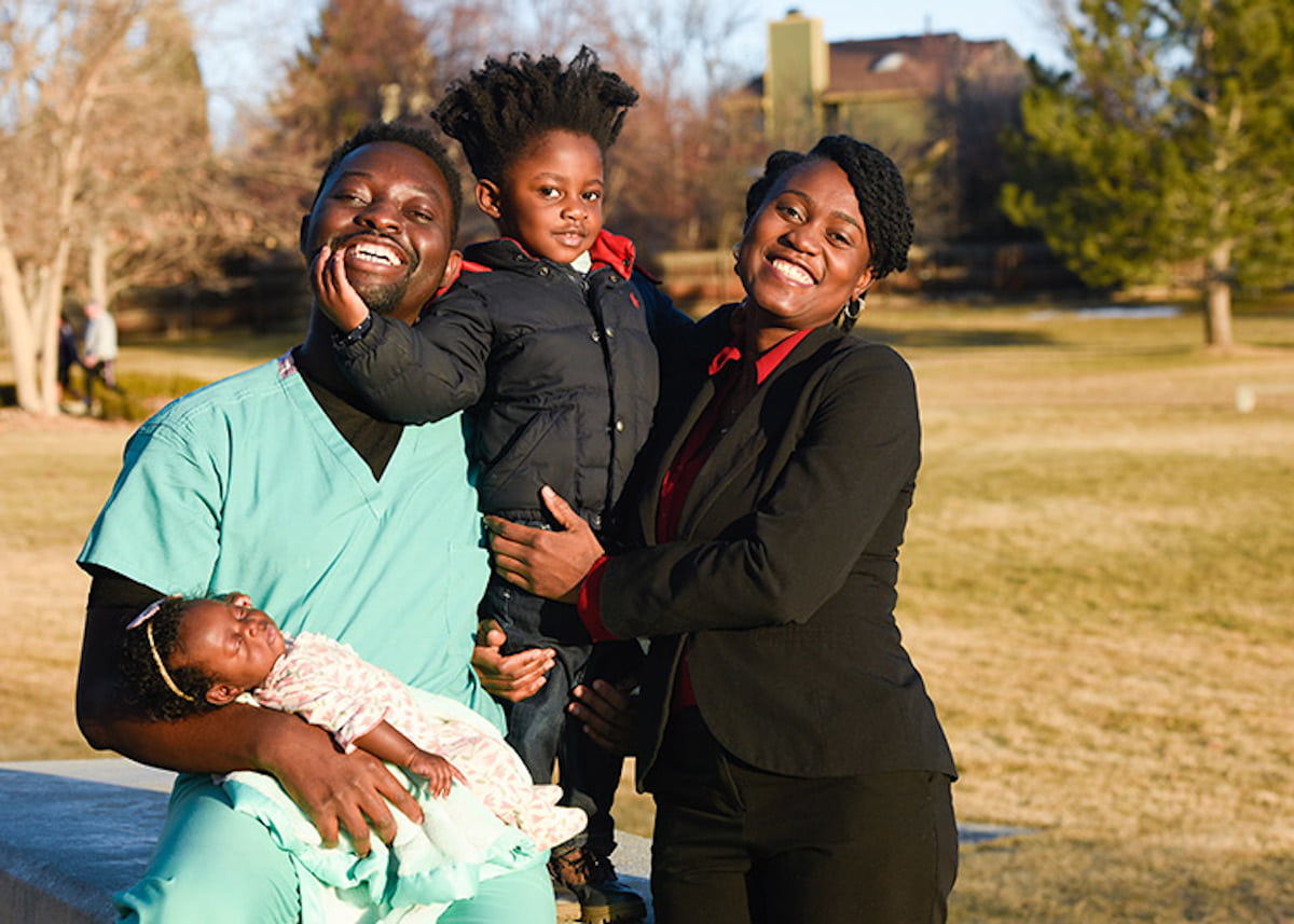Family photo of Drs. Kweku and Cynthia Hazel and two children