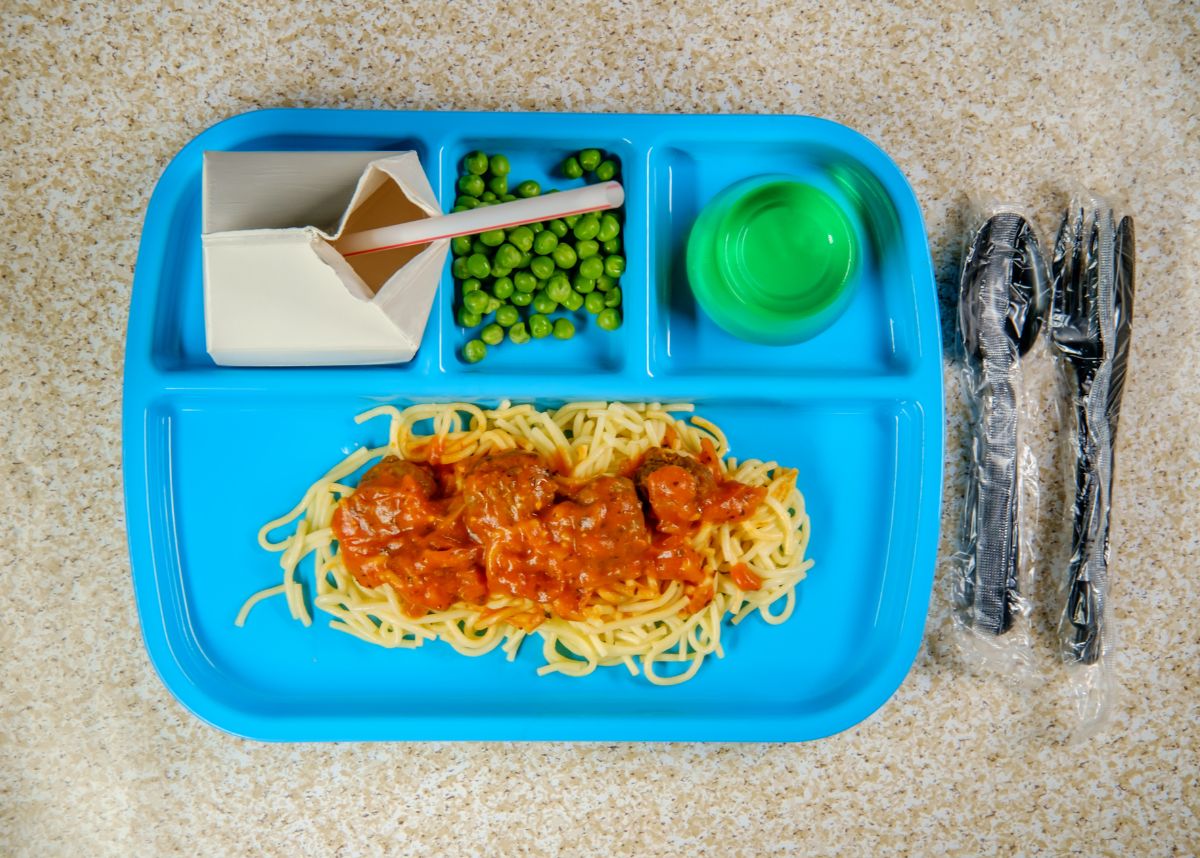 a plate of food served in a school cafeteria