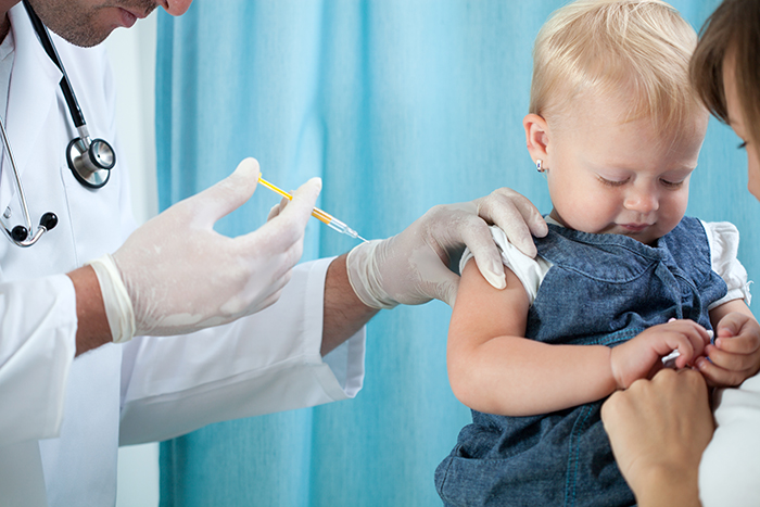 toddler getting vaccination