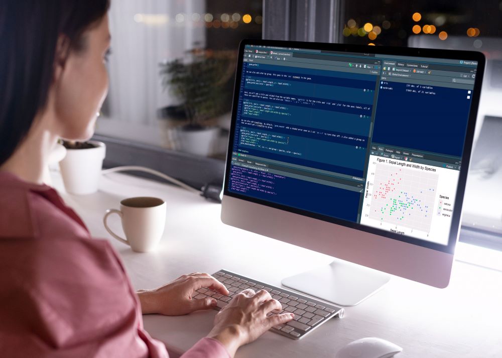 woman typing at computer