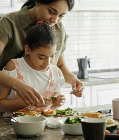 Mom and child making healthy meal