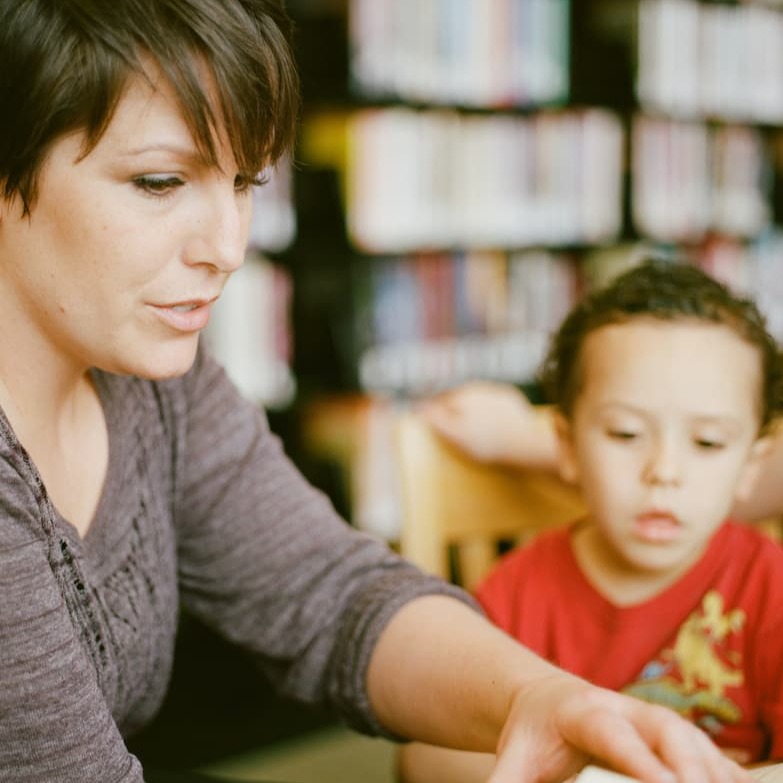 preschool teacher and child