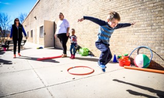 Child playing hopscotch